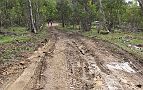 27-Michael & Robert look down at the track damage on a steep slippery section on the Limestone Track